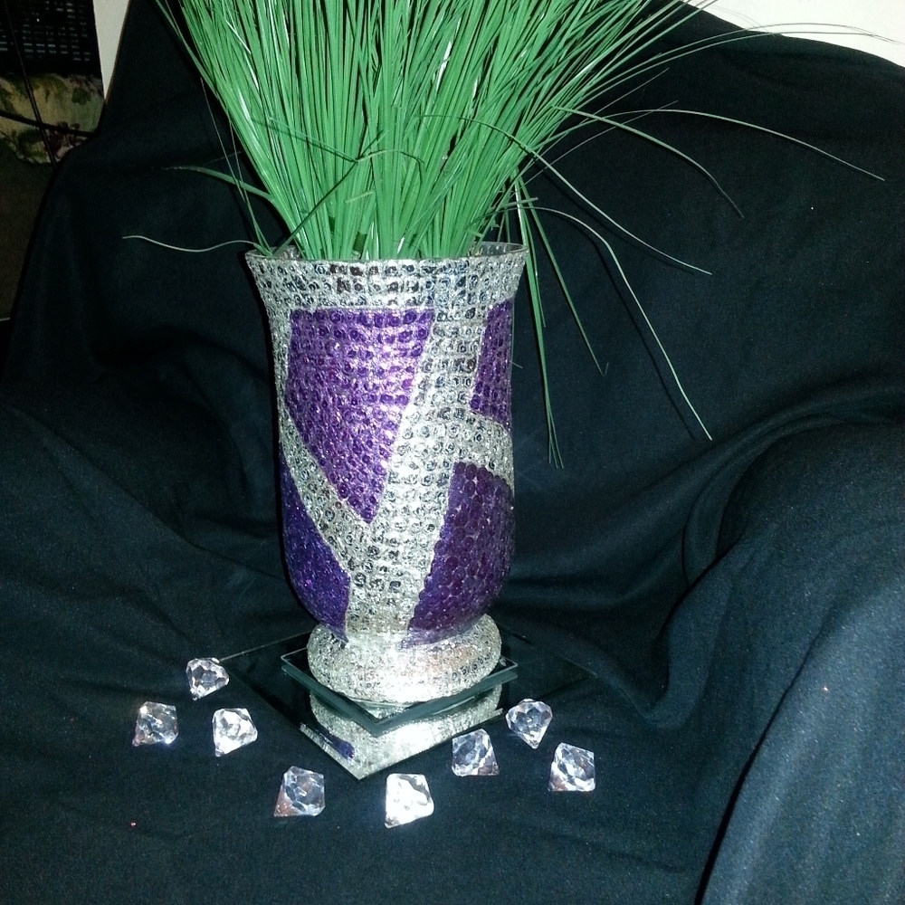 Beautiful tall purple and silver glass planter with artificial plants